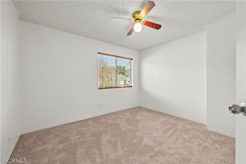 30602 San Martinez Road Val Verde, CA 91384 - Photo 17 of 47 an empty room with a window
