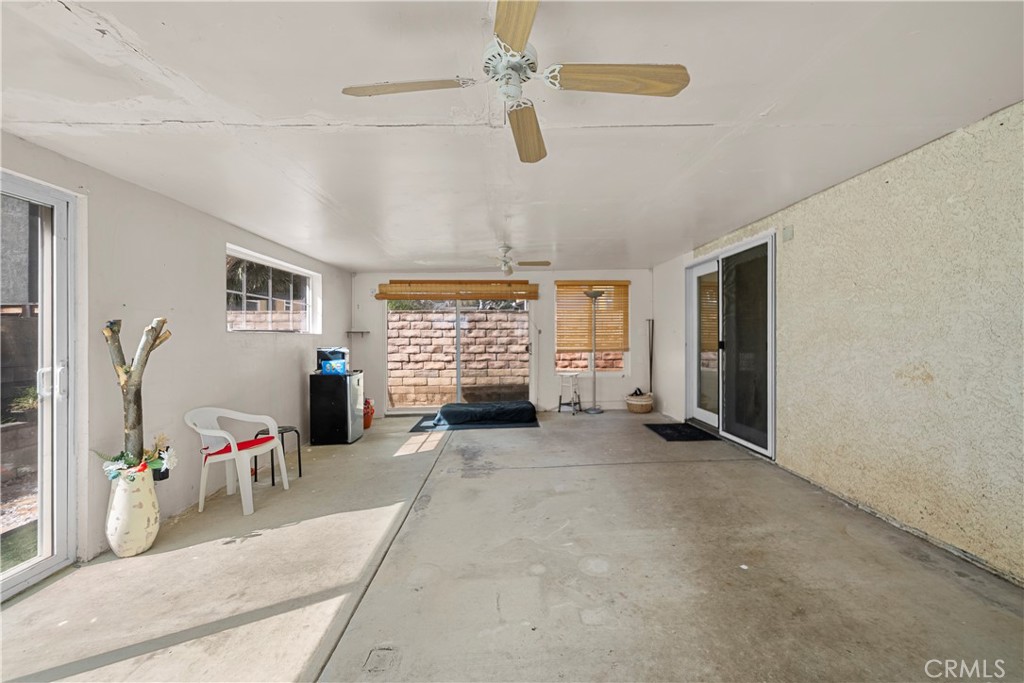 30602 San Martinez Road Val Verde, CA 91384 - Photo 27 of 47 a view of a livingroom with furniture and a ceiling fan