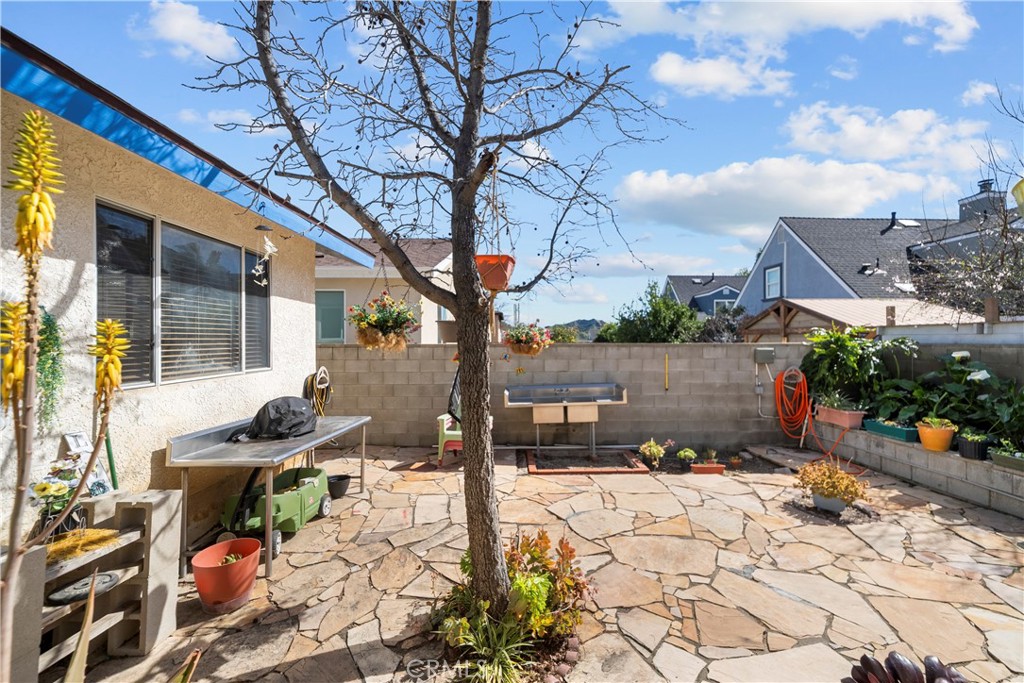 30602 San Martinez Road Val Verde, CA 91384 - Photo 32 of 47 a front view of a house with a yard