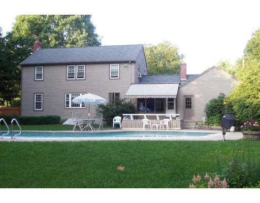 11 James Road Reading, MA 01867 - Photo 9 of 9 a front view of house with yard and outdoor seating