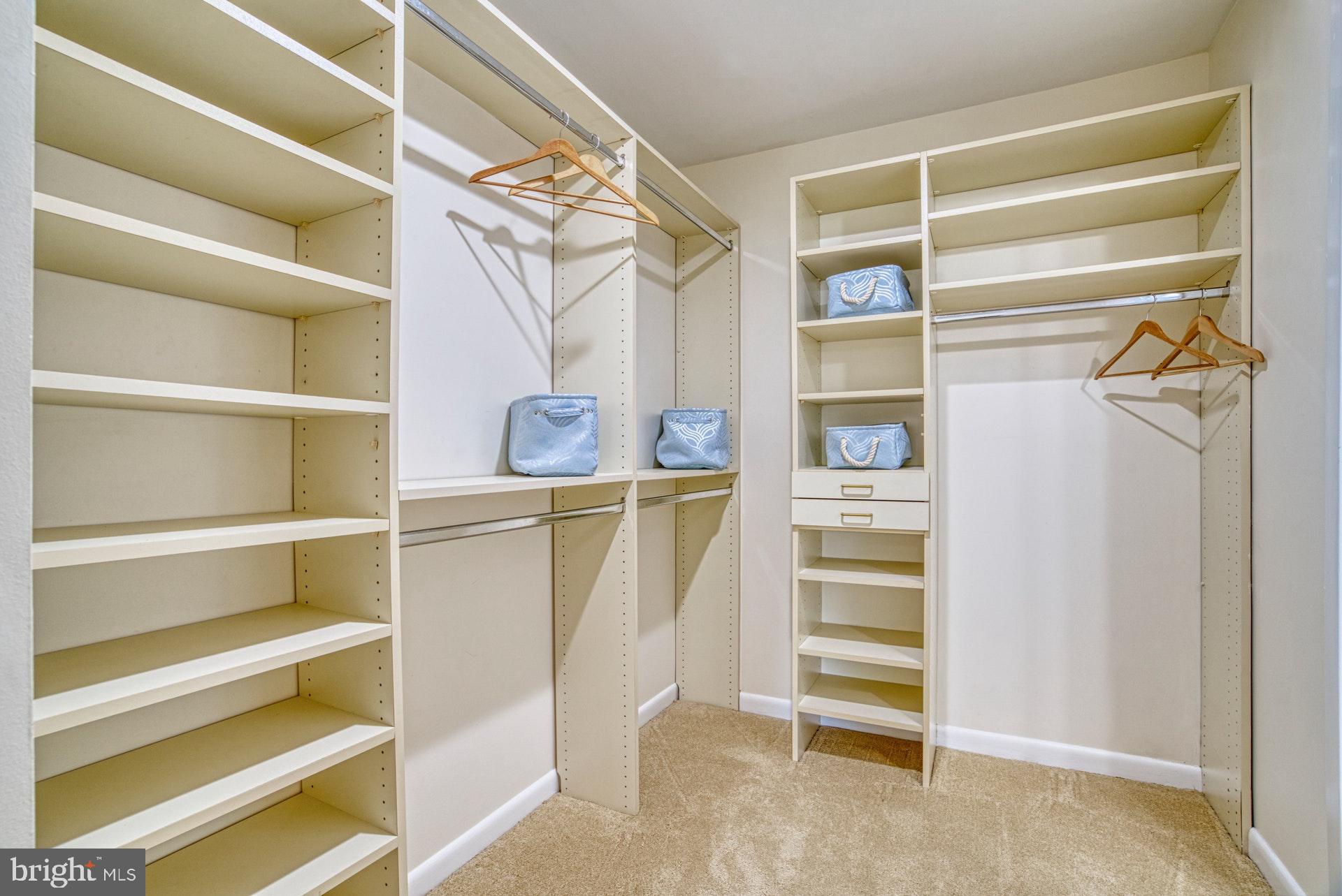11133 Watermans Drive Reston, VA 20191 - Photo 22 of 56 Master/Primary changing room has custom shelving