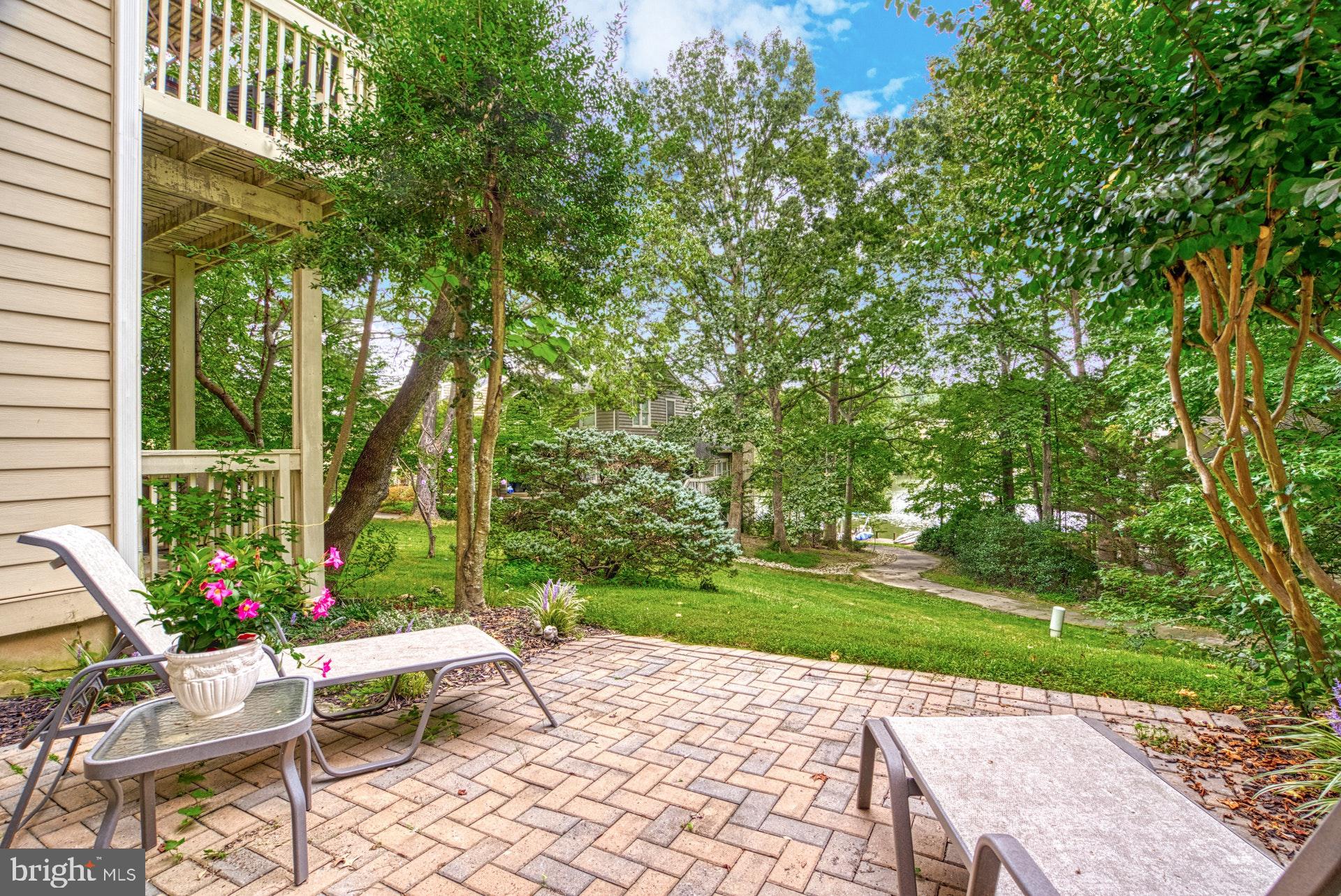 11133 Watermans Drive Reston, VA 20191 - Photo 29 of 56 Custom Paver Patio has views of green space & lake