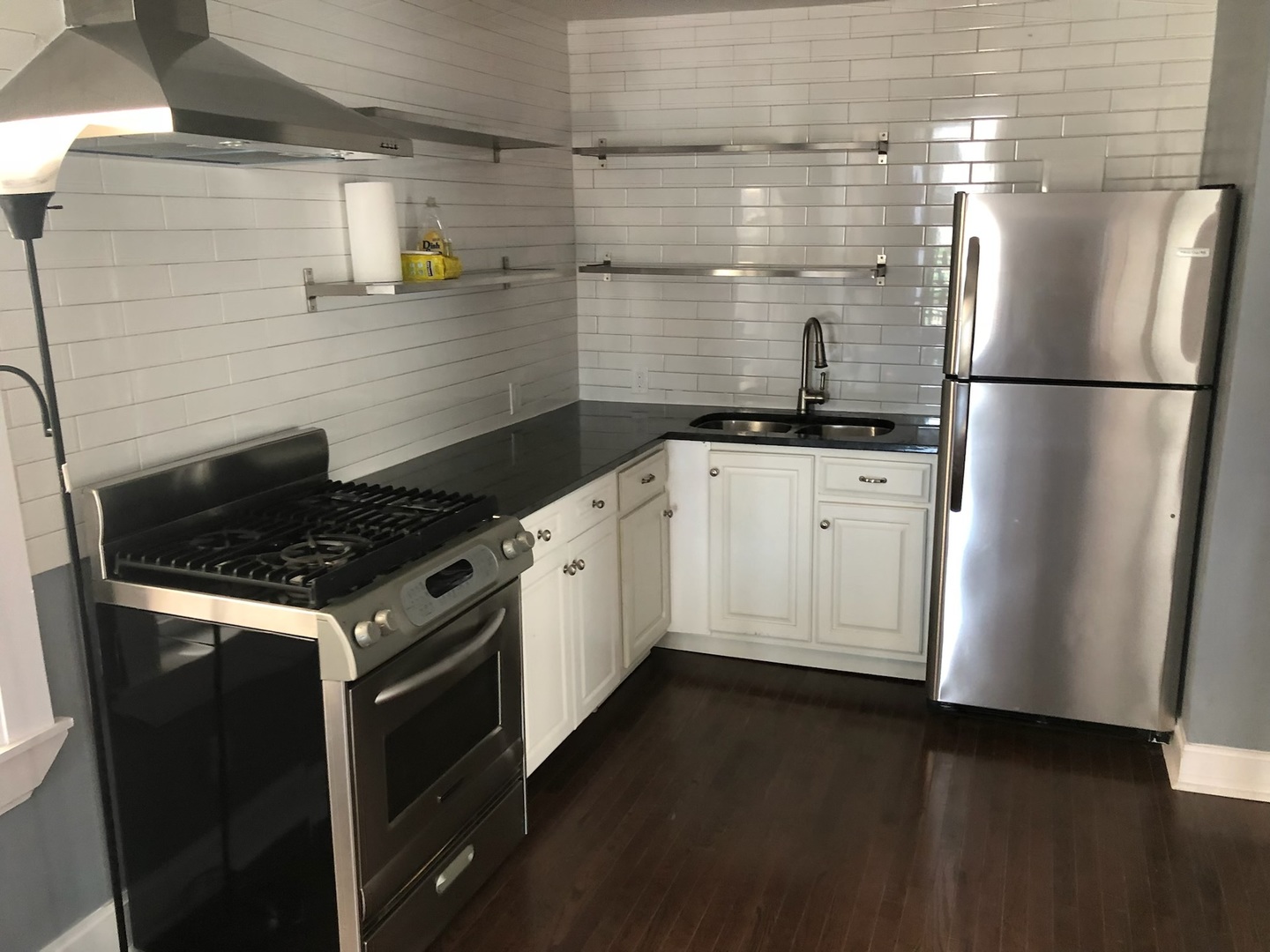 1014 West 19th Street, Unit 2R Chicago, IL 60608 - Photo 3 of 7 a kitchen with a stove sink and refrigerator