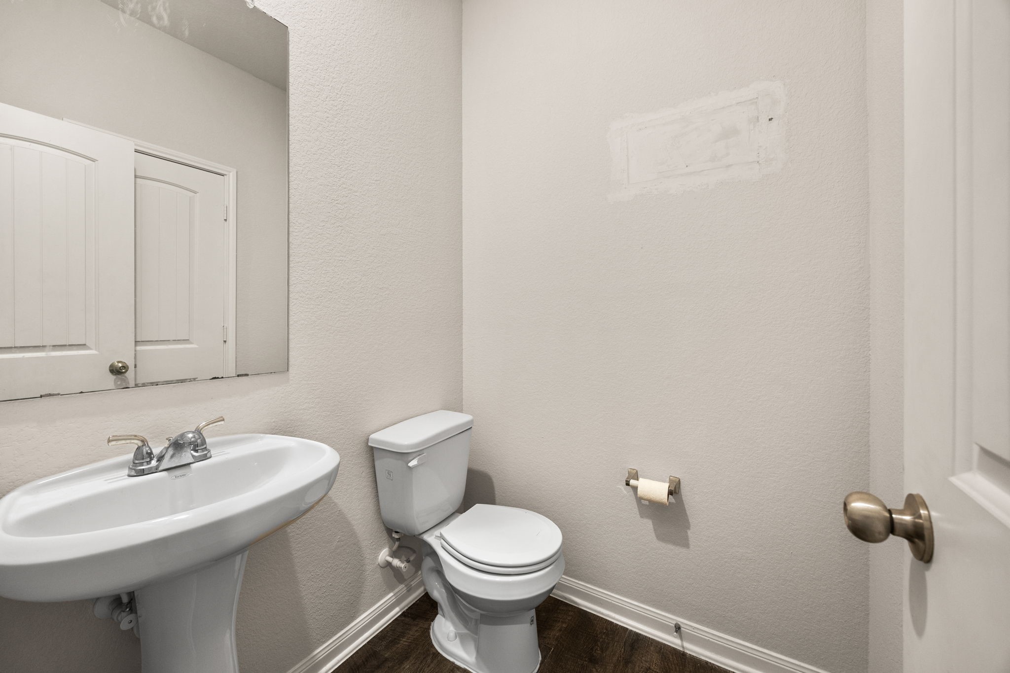 15731 Ty Cobb Court Splendora, TX 77372 - Photo 24 of 36 a bathroom with a sink toilet and a mirror