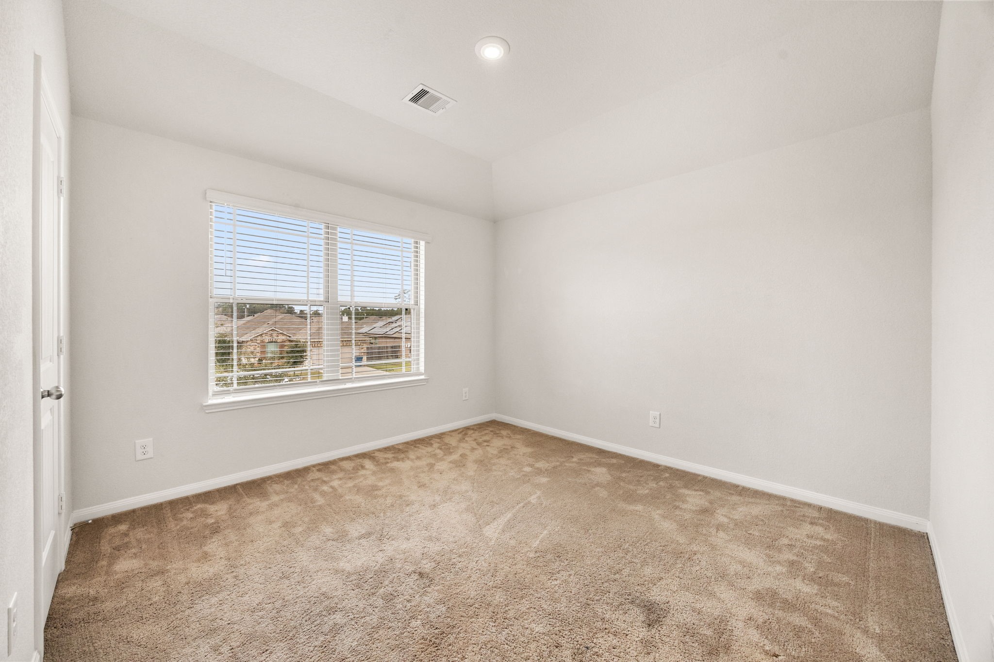 15731 Ty Cobb Court Splendora, TX 77372 - Photo 29 of 36 an empty room with a window