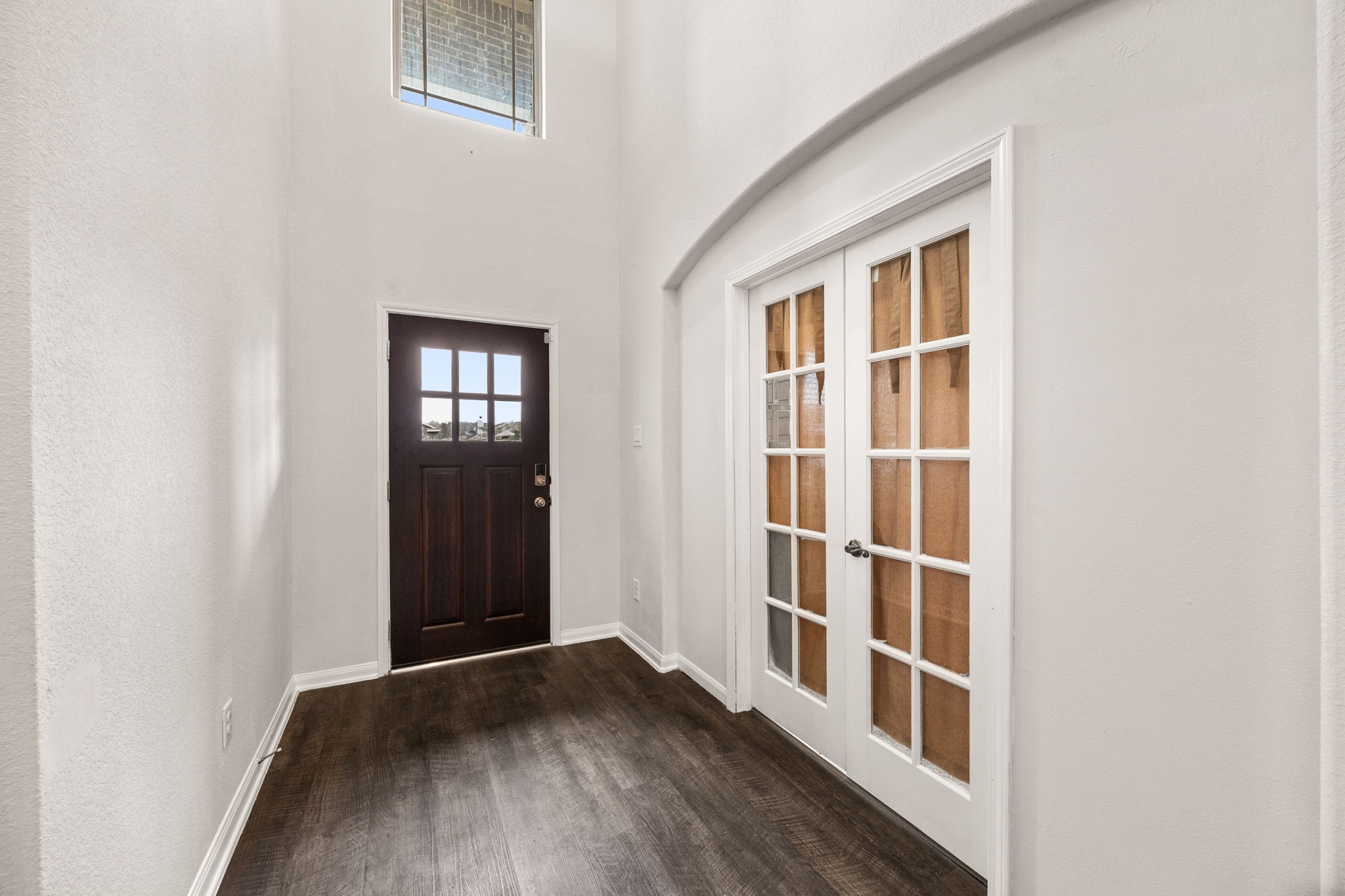 15731 Ty Cobb Court Splendora, TX 77372 - Photo 5 of 36 an entryway with wooden floor and windows