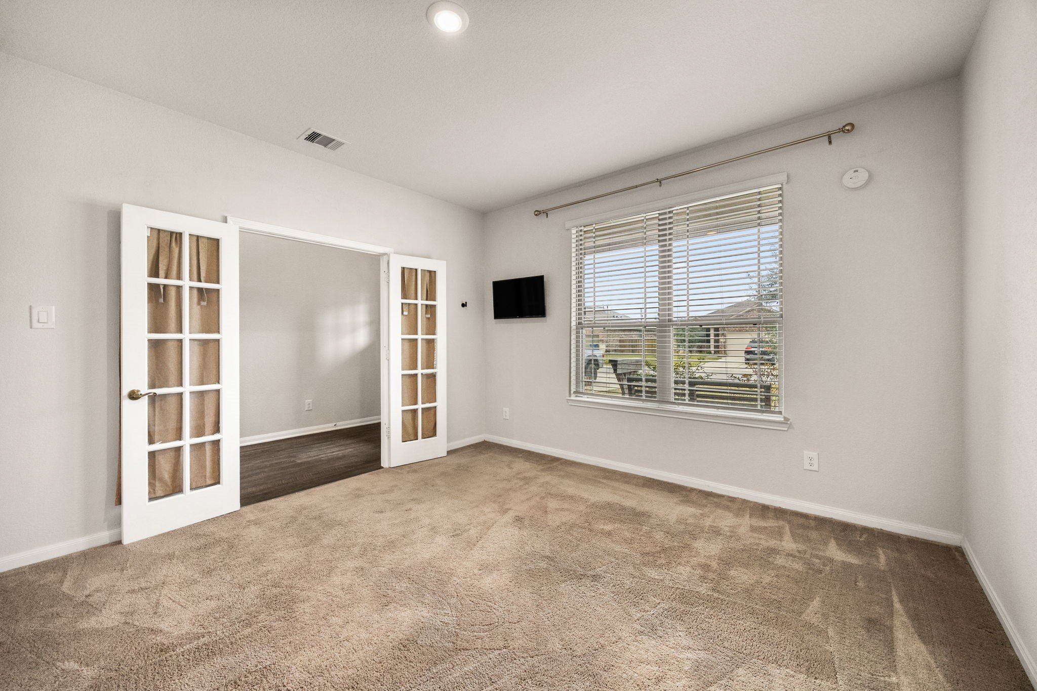 15731 Ty Cobb Court Splendora, TX 77372 - Photo 7 of 36 an empty room with windows