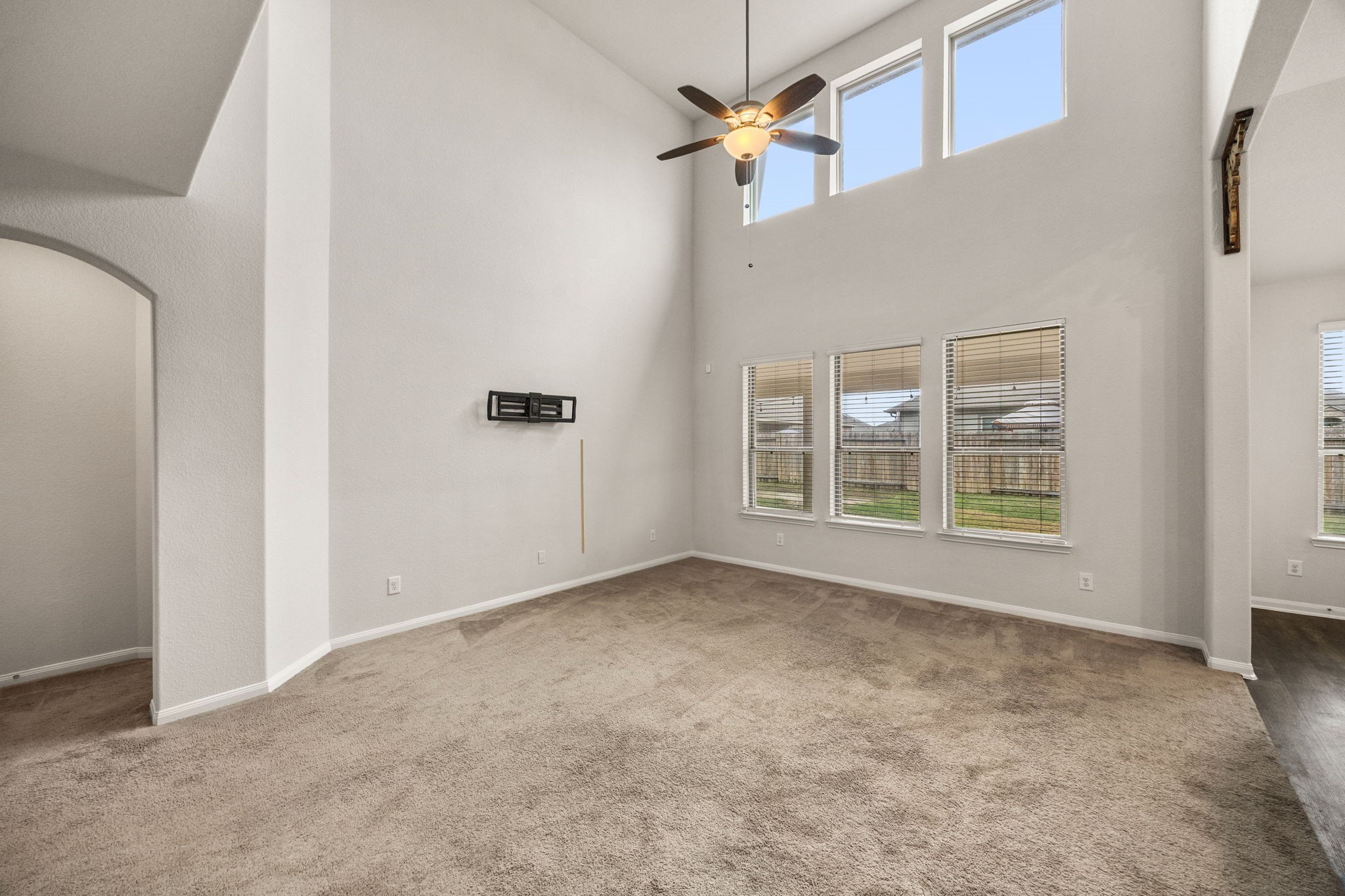 15731 Ty Cobb Court Splendora, TX 77372 - Photo 9 of 36 an empty room with windows