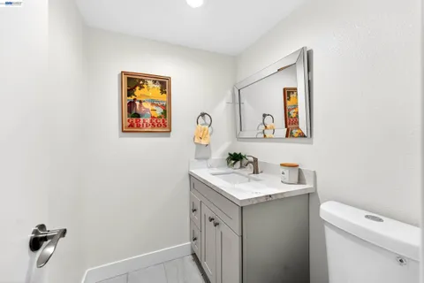 a view of bathroom with dual sinks