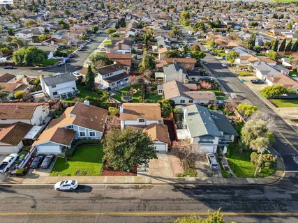 an aerial view of a house with a garden