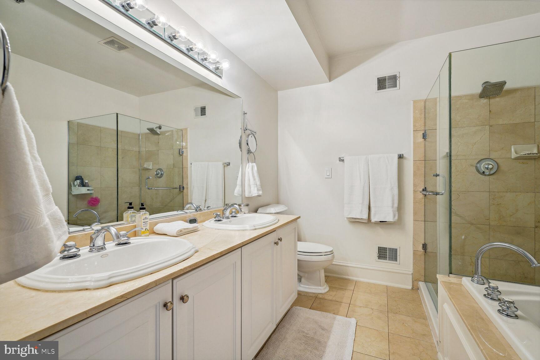 7433 Arlington Road Bethesda, MD 20814 - Photo 24 of 30 Primary en suite bathroom