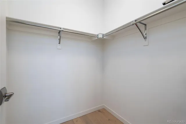 a view of a balcony with chairs