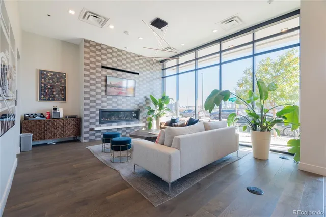 a view of a street with cars on the road