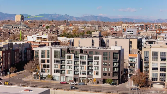 a city street filled with lots of tall buildings