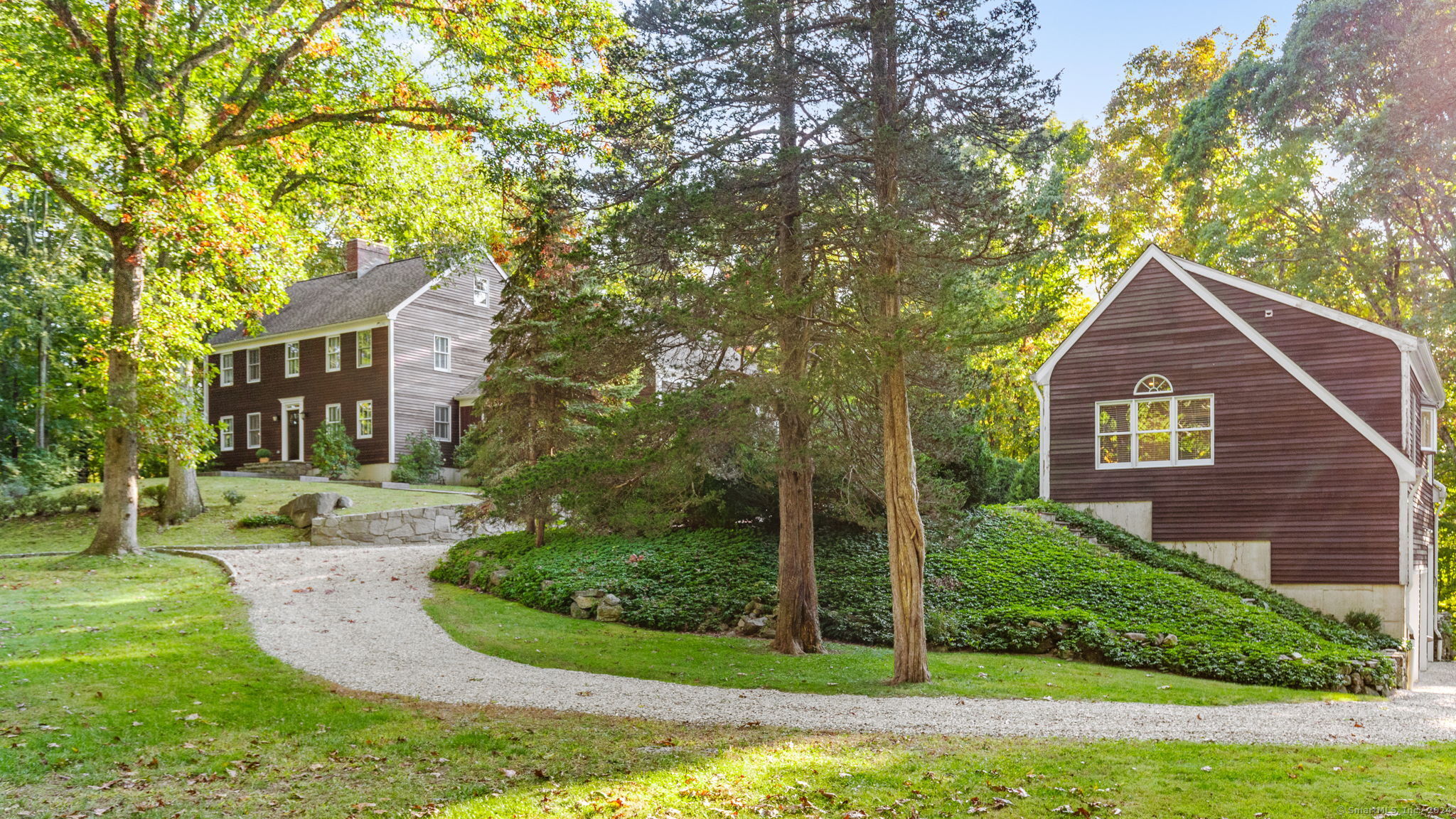 a front view of a house with yard