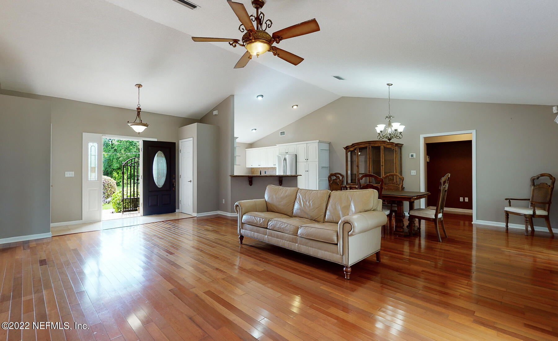 114 Harvard Road St. Augustine, FL 32086 - Photo 5 of 32 a living room with furniture and a large window