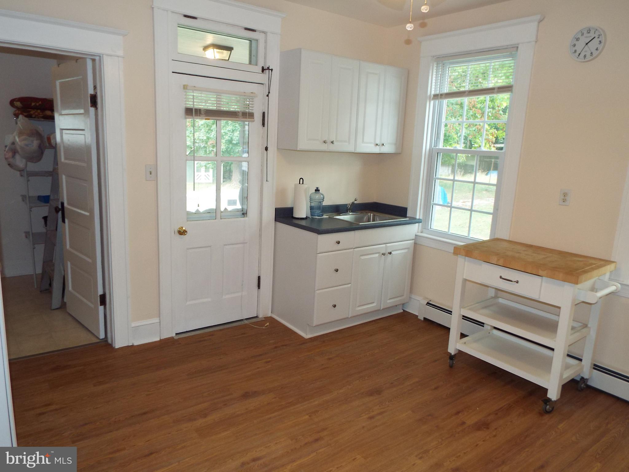7210 Dogwood Road Baltimore, MD 21244 - Photo 12 of 36 Kitchen to Laundry Room View