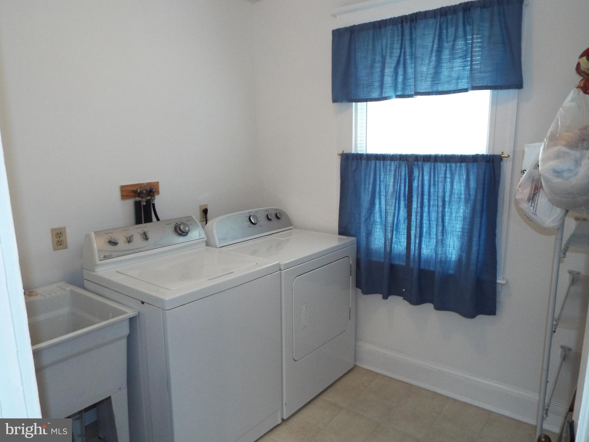 7210 Dogwood Road Baltimore, MD 21244 - Photo 24 of 36 Spacious Laundry Room