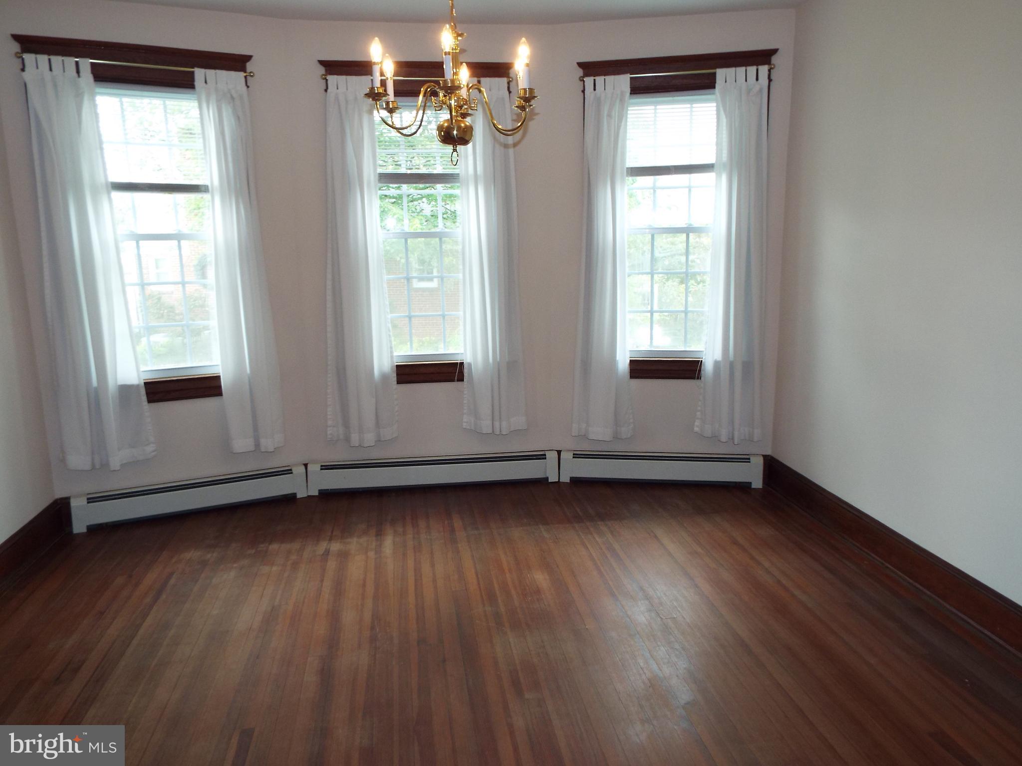 7210 Dogwood Road Baltimore, MD 21244 - Photo 8 of 36 Lots of natural sunlight from the wall of windows