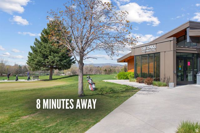 2042 Valley Drive, Unit 57 Mapleton, UT 84664 - Photo 11 of 18 Modern-style building with expansive glass facades and a prominent "THE OAKS" sign