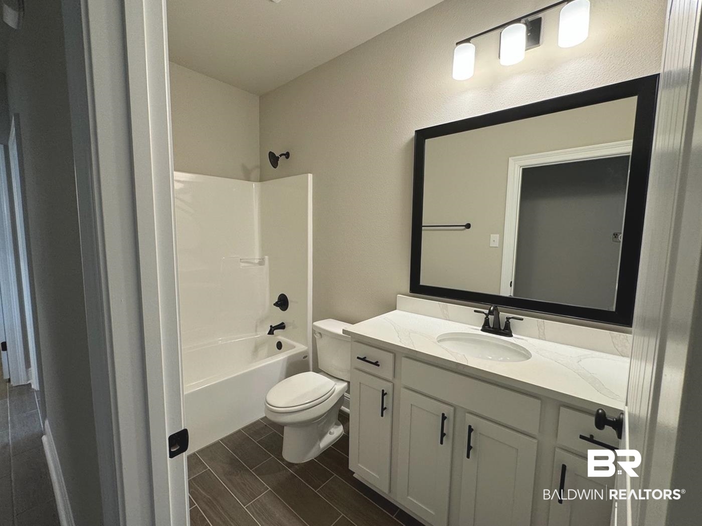 888 Sumter Loop Foley, AL 36535 - Photo 6 of 8 Full bathroom featuring vanity, shower / washtub combination, and toilet