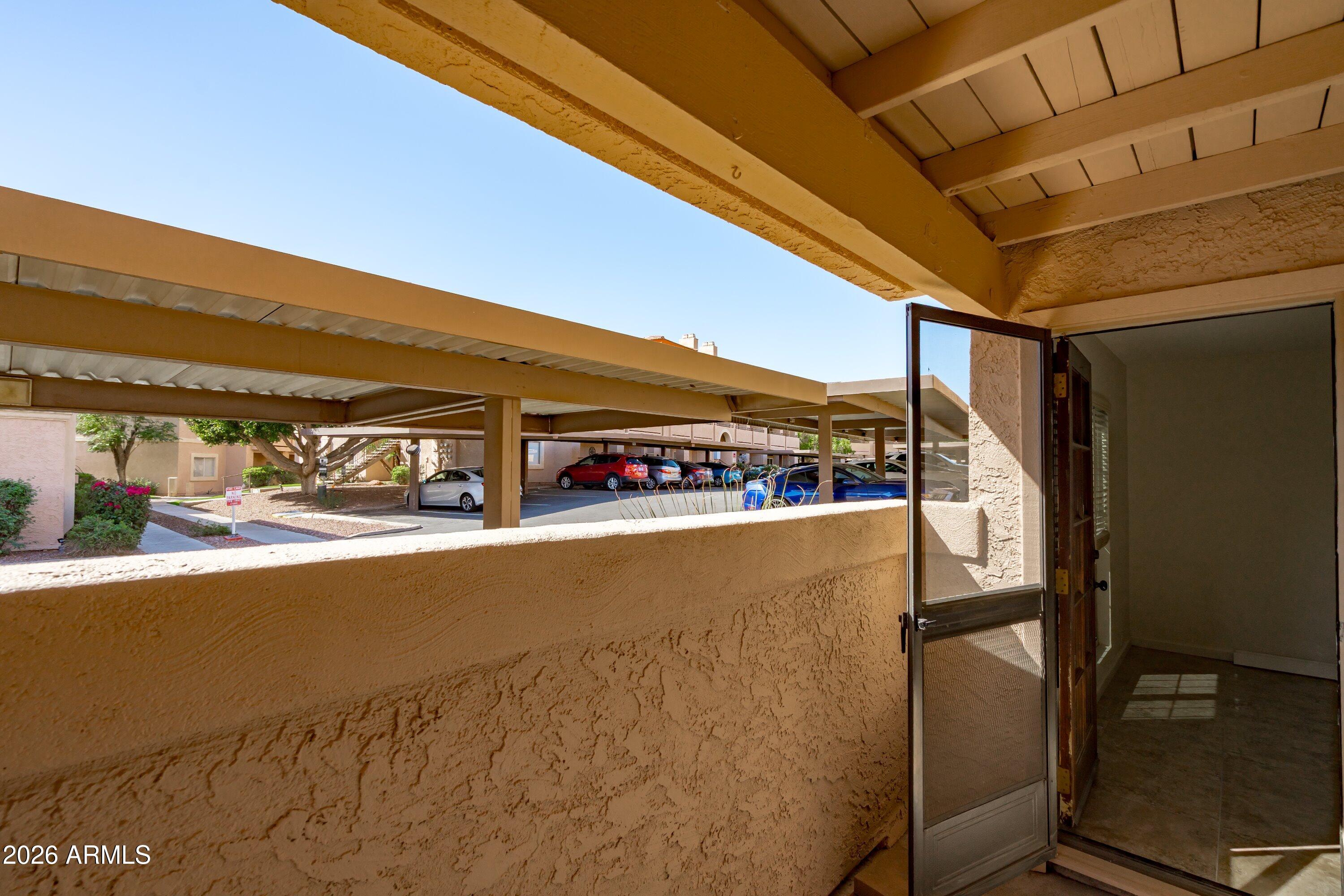 10410 North Cave Creek Road, Unit 1031 Phoenix, AZ 85020 - Photo 27 of 28 a view of swimming pool with an outdoor seating