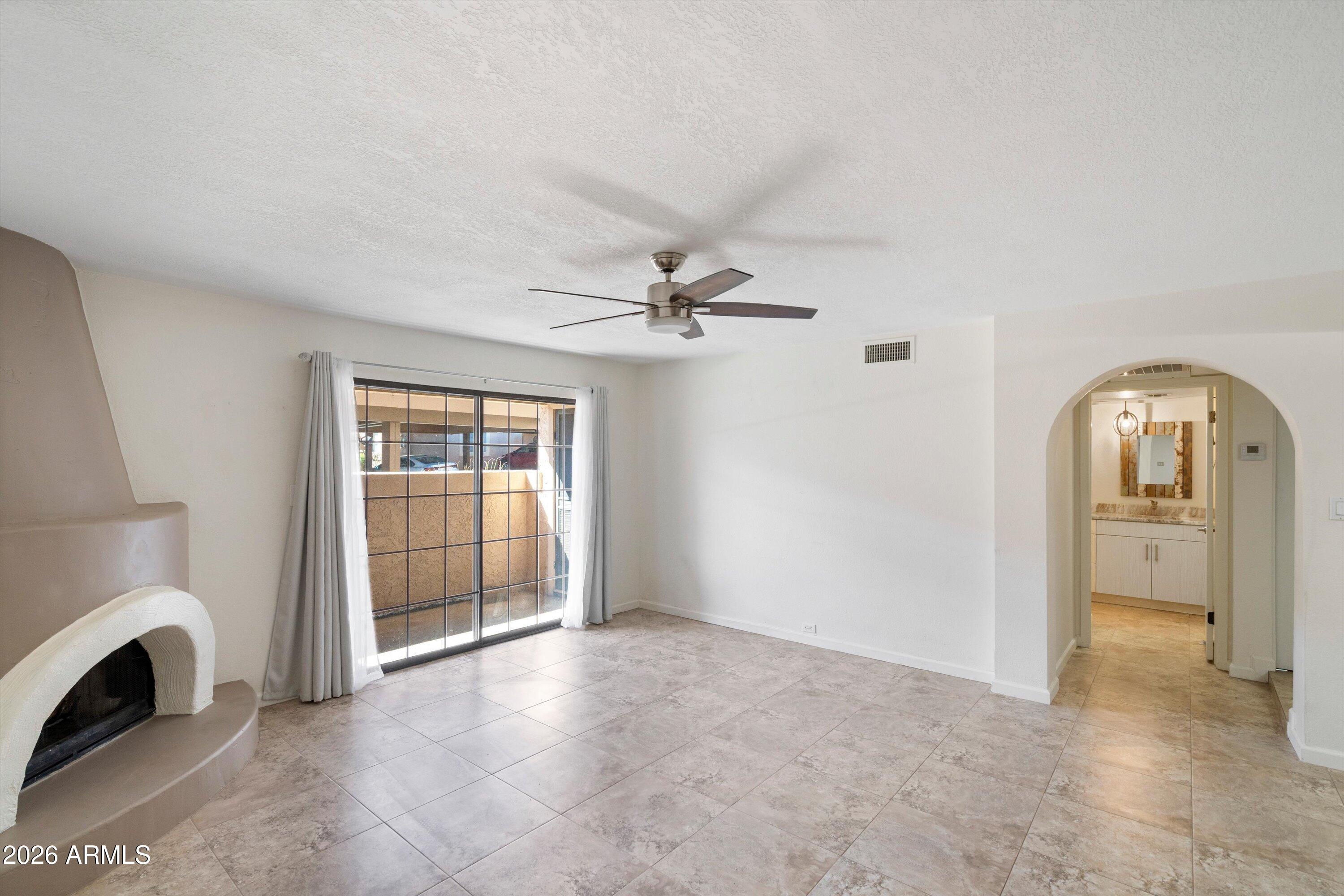 10410 North Cave Creek Road, Unit 1031 Phoenix, AZ 85020 - Photo 7 of 28 a view of livingroom with furniture and window