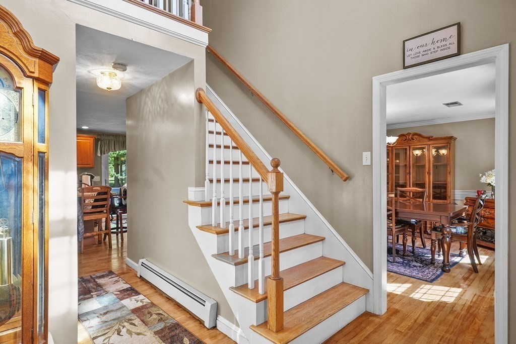 2 Commons Drive Carver, MA 02330 - Photo 15 of 37 a view of entryway and hall with wooden floor