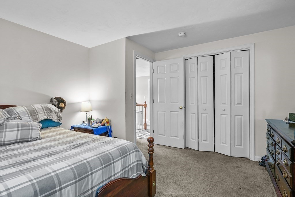 2 Commons Drive Carver, MA 02330 - Photo 21 of 37 a bedroom with a bed and a window