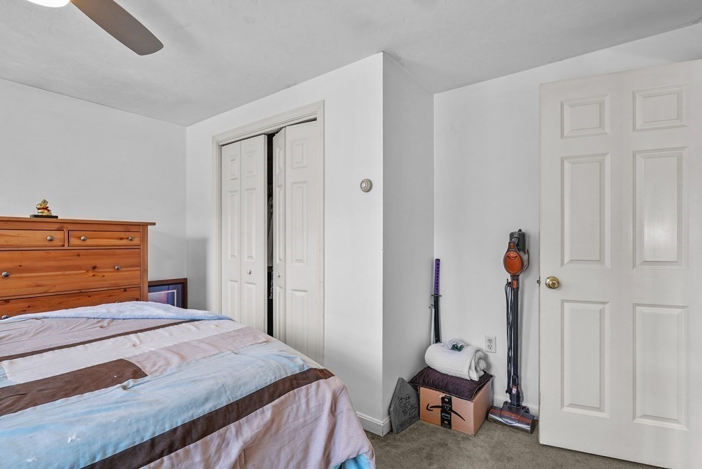 2 Commons Drive Carver, MA 02330 - Photo 24 of 37 a bedroom with a bed and a window