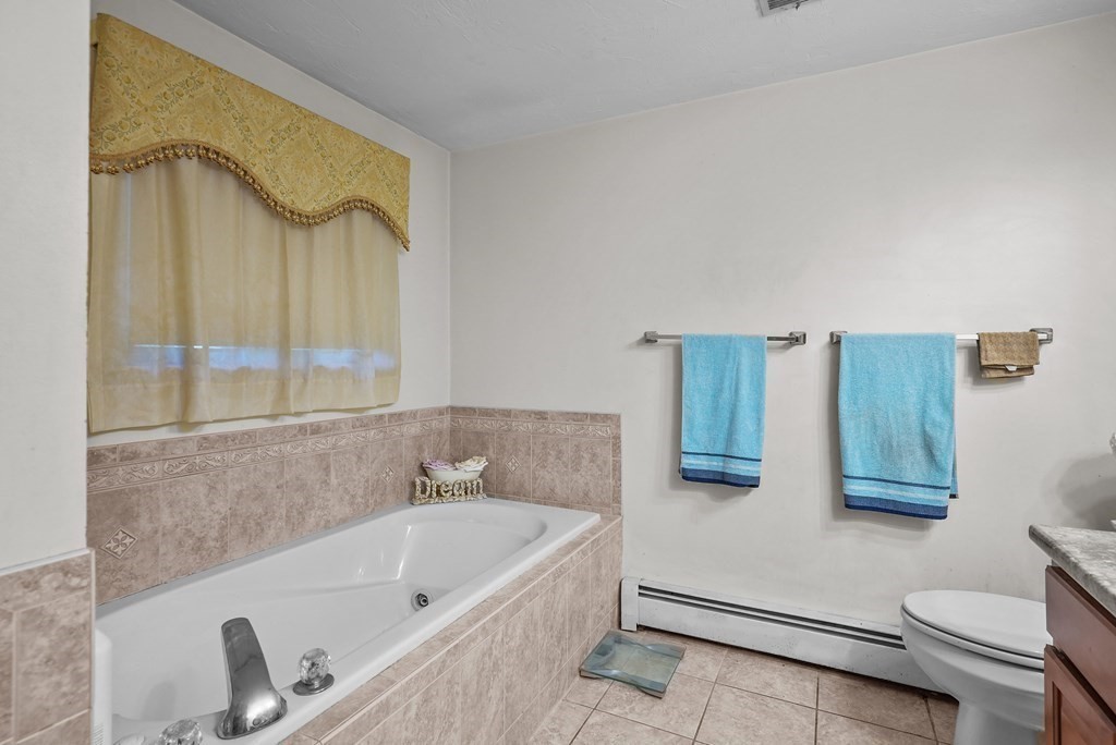 2 Commons Drive Carver, MA 02330 - Photo 28 of 37 a bathroom with a tub sink and toilet