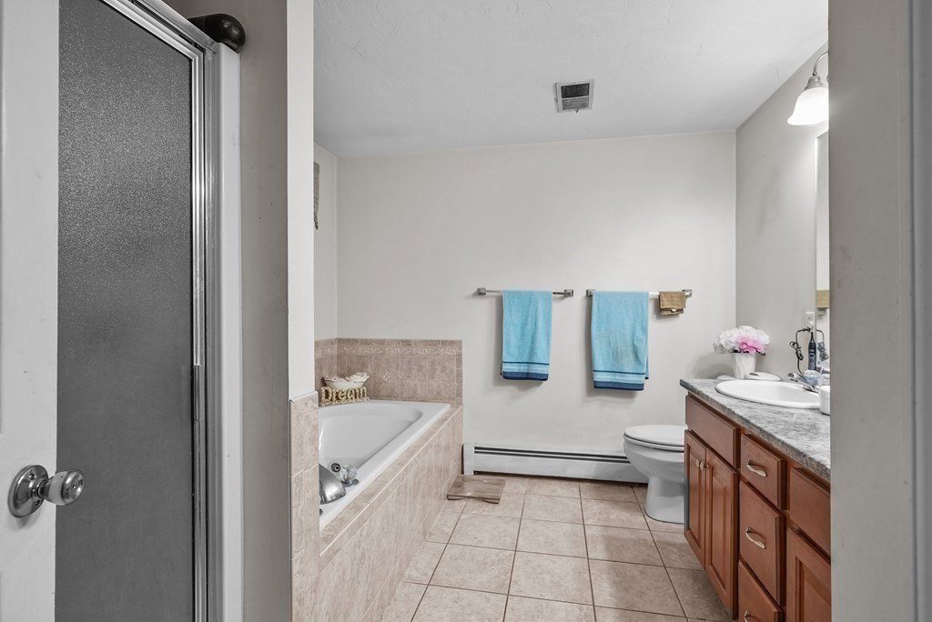 2 Commons Drive Carver, MA 02330 - Photo 29 of 37 a bathroom with a sink toilet and tub
