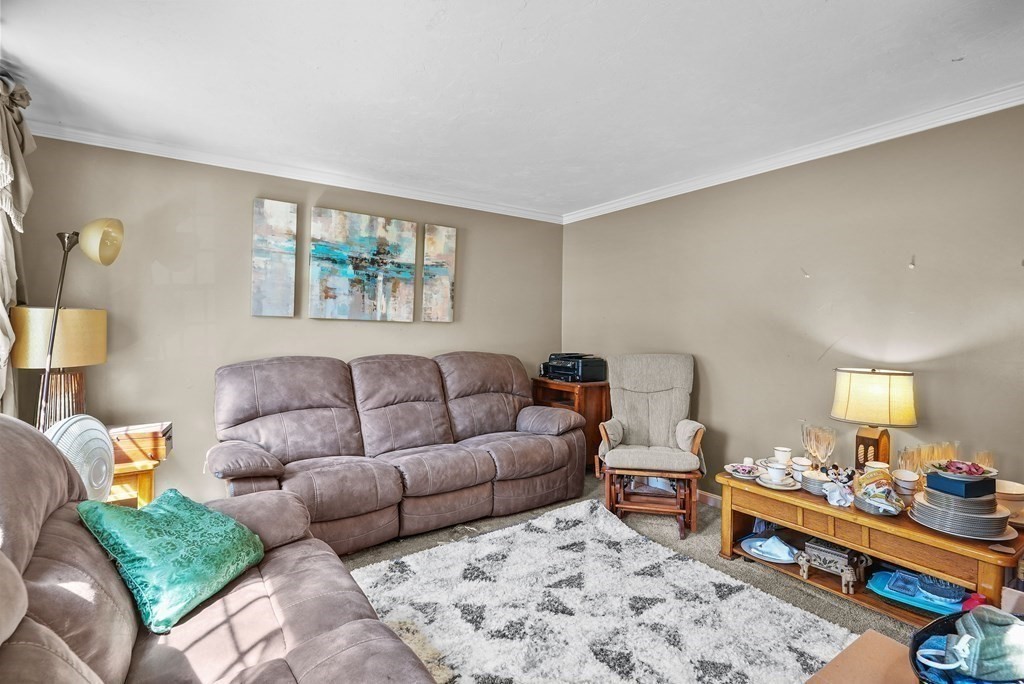 2 Commons Drive Carver, MA 02330 - Photo 30 of 37 a living room with furniture and a couch