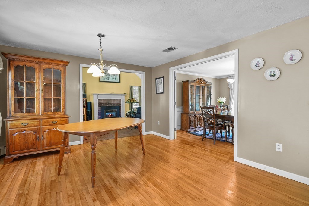 2 Commons Drive Carver, MA 02330 - Photo 8 of 37 a living room with furniture and a fireplace