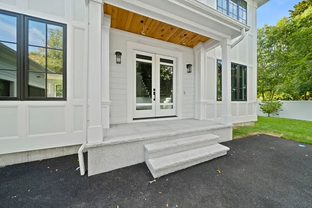a view of backyard with a table and chair