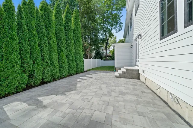 a view of a terrace with a garden