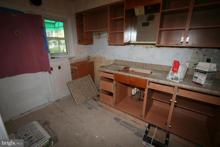 5010 West Hills Road Baltimore, MD 21229 - Photo 15 of 30 a room with storage and utility