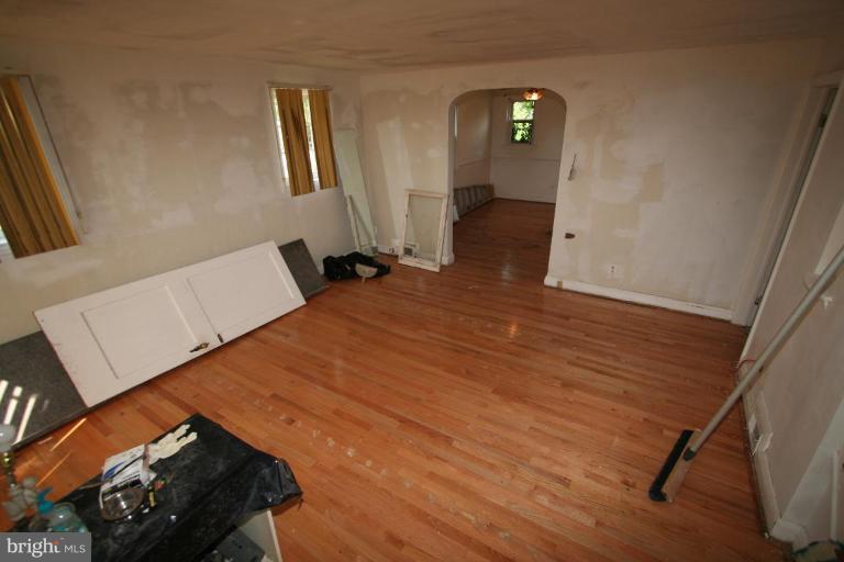 5010 West Hills Road Baltimore, MD 21229 - Photo 10 of 30 a view of an empty room and wooden floor