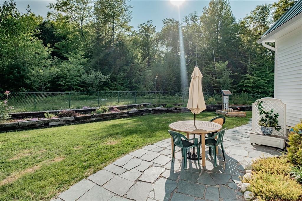 71 Hardscrabble Road Sweden, ME 04040 - Photo 3 of 35 Back patio area looking at perineal...