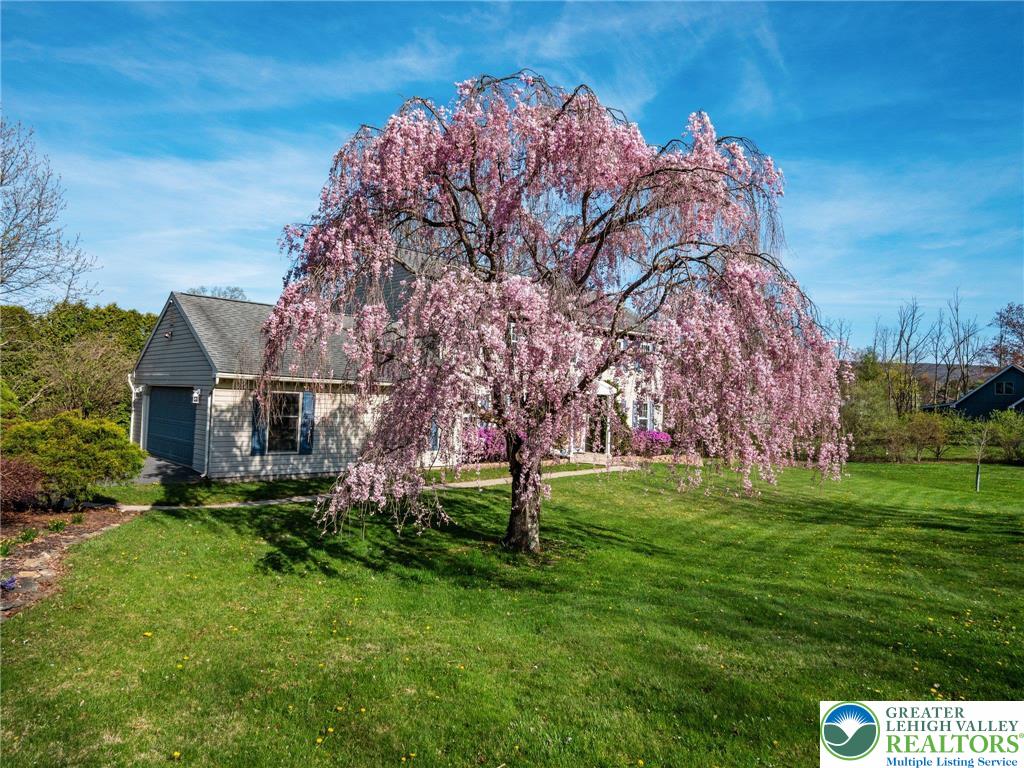 861 Point Phillips Road Bath, PA 18014 - Photo 2 of 32 a front view of a house with garden