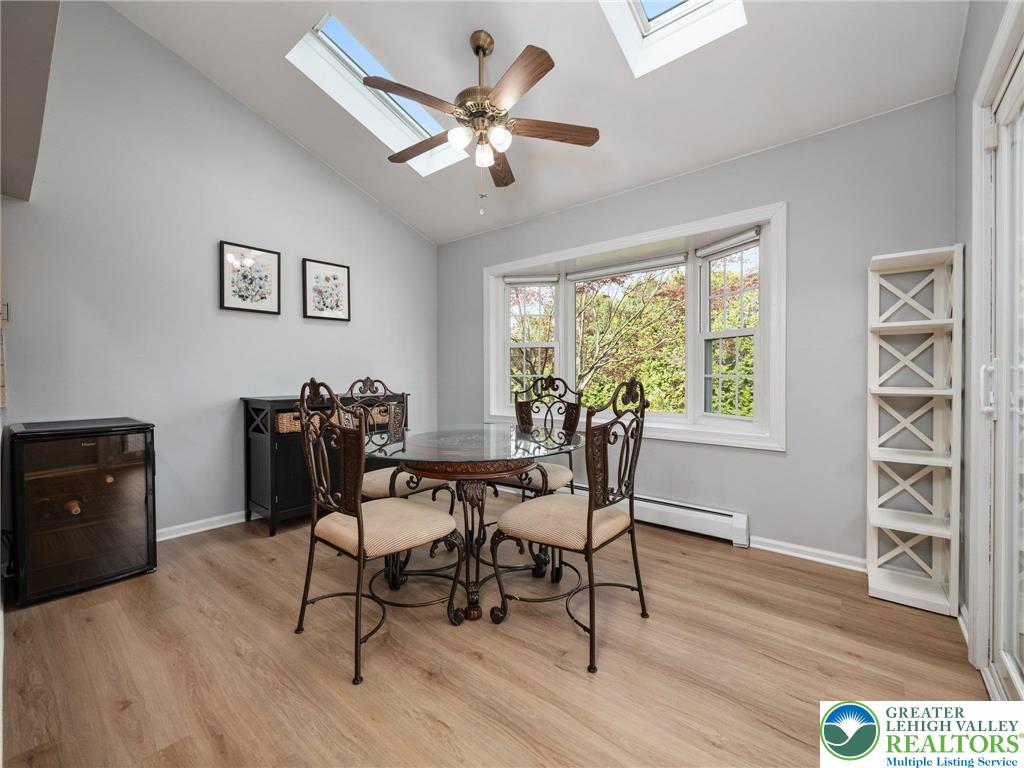 861 Point Phillips Road Bath, PA 18014 - Photo 7 of 32 a dining room with wooden floor and a window