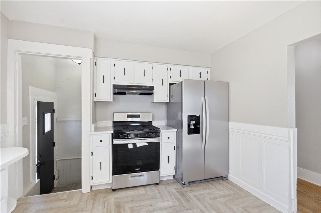 1925 Sunset Avenue Springfield, OH 45505 - Photo 21 of 45 This bright kitchen features modern appliances and classic details, offering both style and functionality.