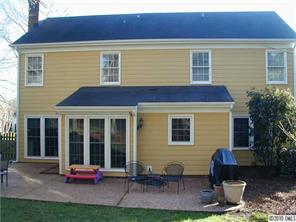 9815 Park Spring Charlotte, NC 28210 - Photo 2 of 15 a backyard of a house with outdoor seating