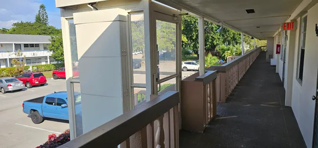 a view of swimming pool from a balcony
