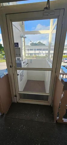 a kitchen with stainless steel appliances a stove a microwave a sink and cabinets
