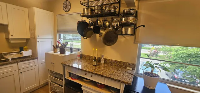 a kitchen with a stove and a refrigerator