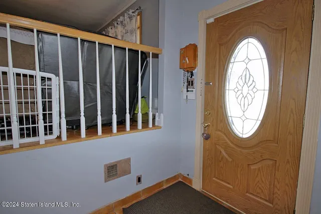 a view of a door with wooden walls