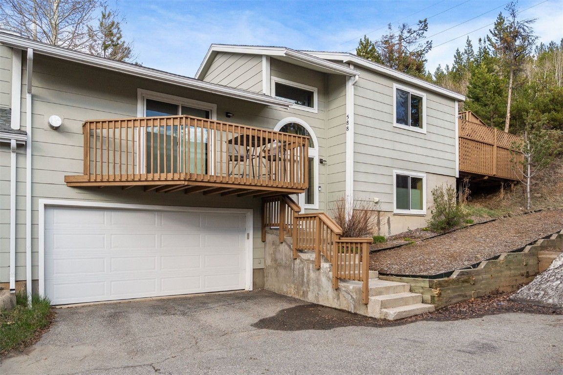 588 Alpine Road Dillon, CO 80435 - Photo 33 of 41 Front of house with a garage and a balcony
