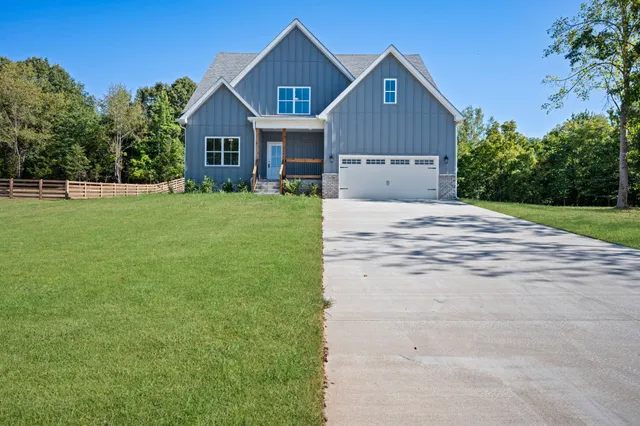 front view of a house with a yard