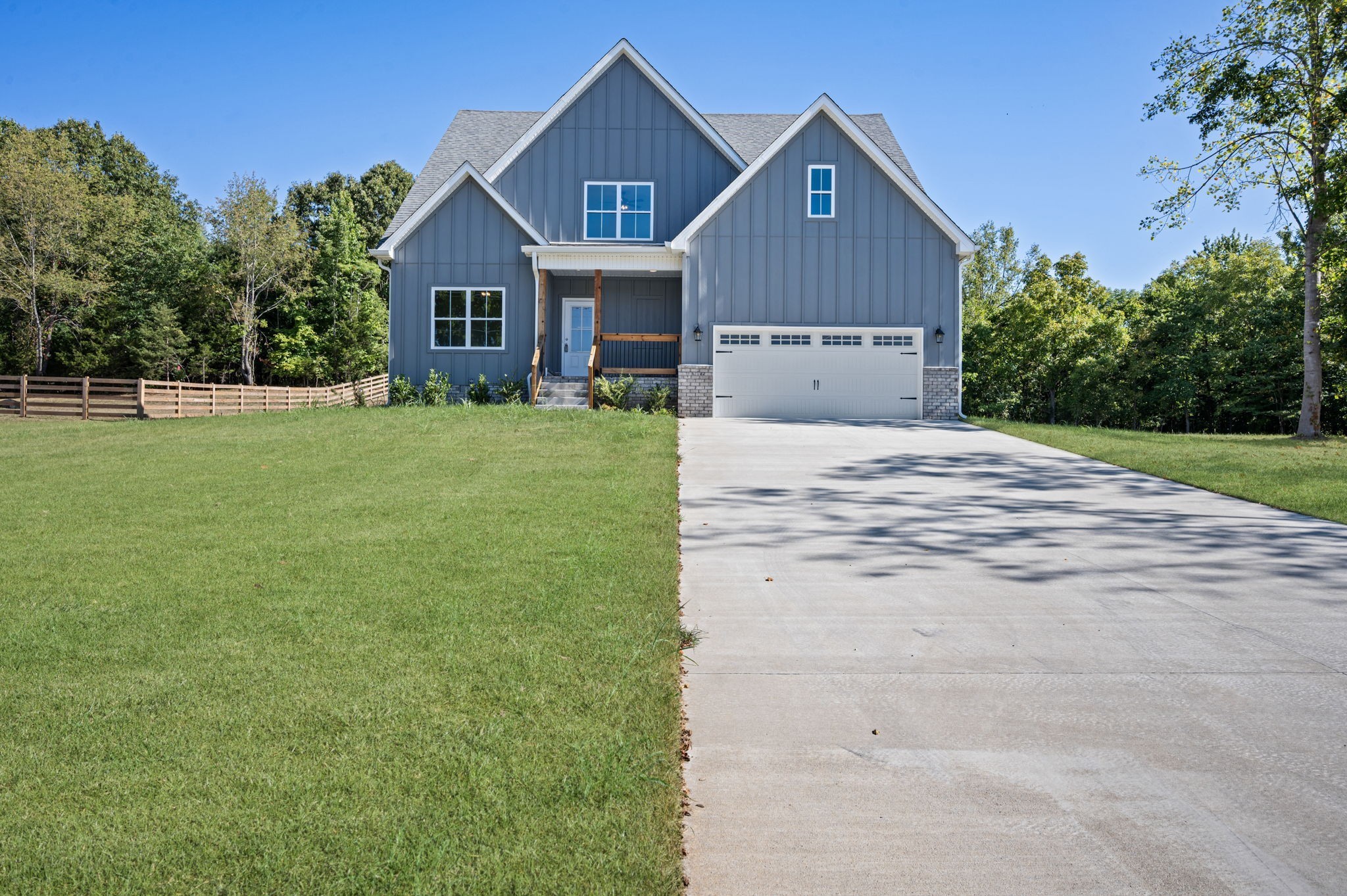 front view of a house with a yard